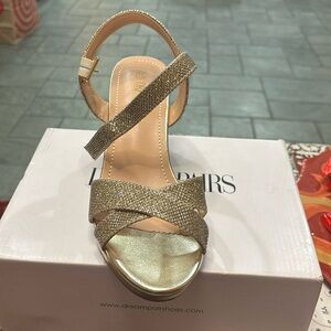 Gold sandals. Size 7.5. New in box.
